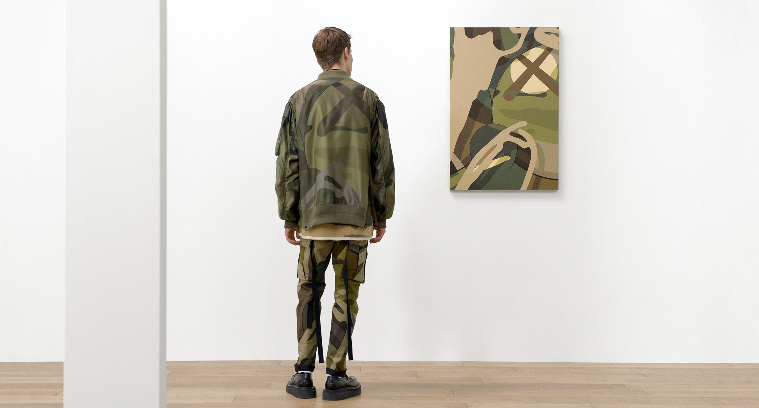 ショッピング 新品sacai x KAWS MA-1ブルゾン 2サイズ CAMOUFLAGE tbg.qa